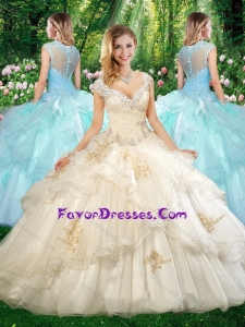 Exquisite Straps Champagne Quinceanera Dresses with Beading and Appliques