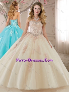 Beautiful Tulle Champagne Quinceanera Gown with Appliques and Beading