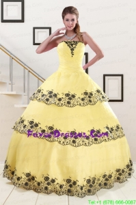 2015 Light Yellow Quinceanera Dress with Appliques and Ruffled Layers