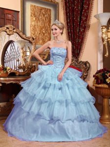 Light Blue Ball Gown Strapless Ruffled Dress for Quince in Organza with Beading