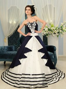Navy Blue and White Ball Gown Strapless Beaded Quinceanera Dress with Appliques