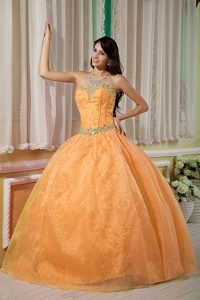 Golden Ball Gown Sweetheart Organza Quinceanera Dress with Beading for Less