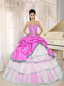 Beaded Sweetheart Dresses for Quinces with Ruffled Layers and Pick-ups