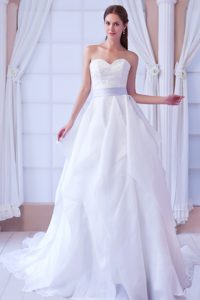 White Sweetheart Appliqued Wedding Dress with Jacket and Lilac Sash