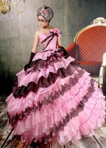 Beaded Baby Pink and Black Prom Gowns with Ruffled Layers and Flowers