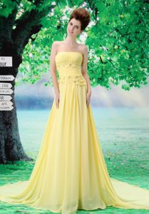 Nice Light Yellow Strapless Prom Gown with Ruched Bodice and Beading