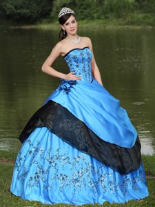 Aqua Blue and Black Dress for Quince with Hand Made Flowers and Embroidery