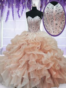 Sweetheart Sleeveless Quince Ball Gowns Floor Length Beading and Ruffles Peach Organza