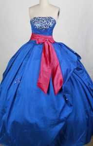 Blue Strapless Quinces Dresses in Taffeta with Beading and Red Bowknot