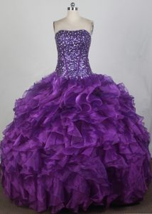 Eggplant Purple Beaded Organza Quinceanera Dress with Handle Flower