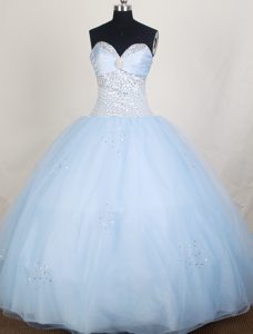 Light Blue Appliqued and Beaded Quinceanera Gown in Taffeta and Organza