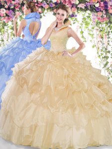 Dynamic Champagne Organza Backless High-neck Sleeveless Floor Length Quinceanera Gown Beading and Ruffled Layers