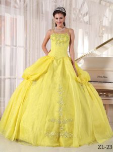 Multi-tiered Yellow Appliqued Dresses for a Quinces with Spaghetti Straps