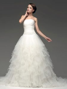 Extravagant White Ball Gowns Tulle Strapless Sleeveless Beading and Ruffles Lace Up Wedding Dress Sweep Train