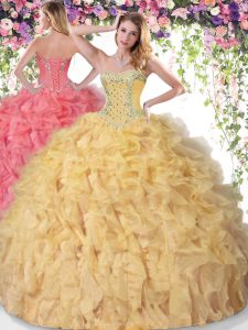 Unique Sleeveless Organza Floor Length Lace Up Vestidos de Quinceanera in Gold with Beading and Ruffles
